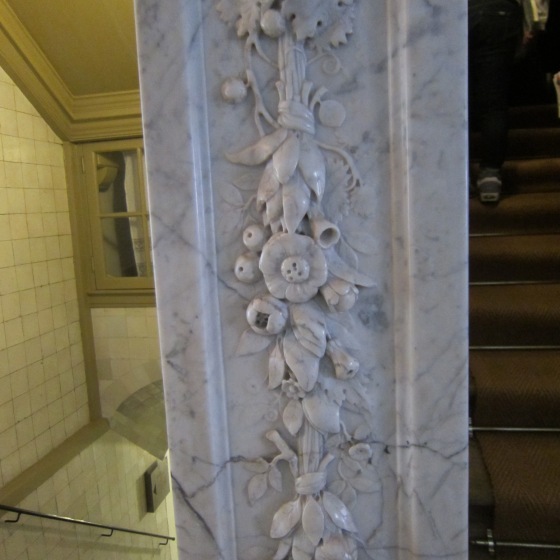 Fine 17th century carvings and tiles in one of the stairwells at the Trippenhuis