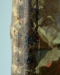 Nail marks, remnants of varnish and of paint from the original frame